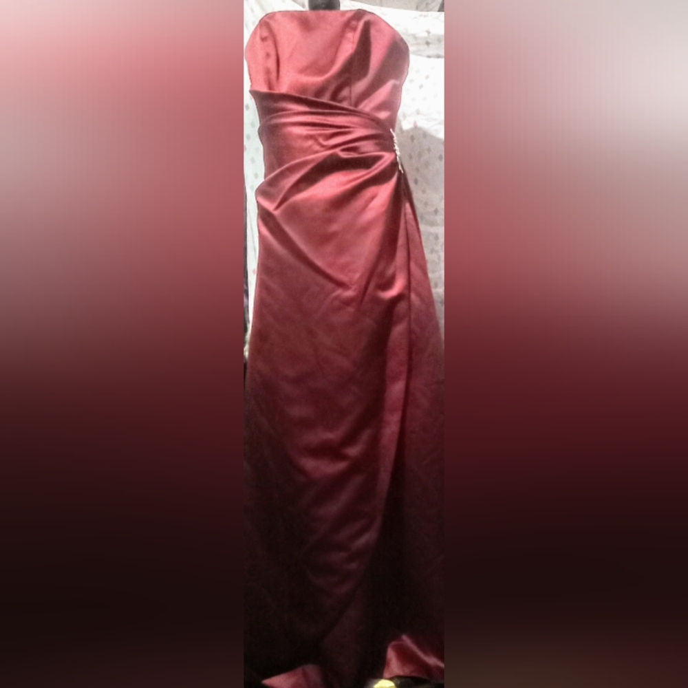 A maroon colored Davids Bridal dress